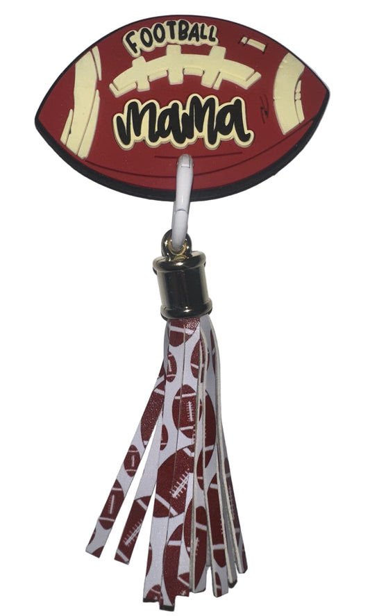 Football-shaped lanyard with tassel on a gray background