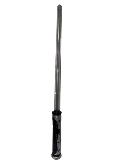 Long metal rod with a handle against a textured white wall